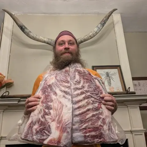 nick with ribs and horns